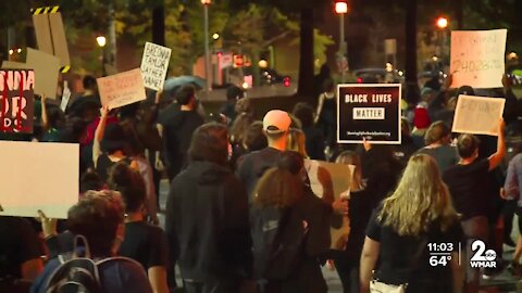 People march through Downtown Baltimore protesting police violence against Black people