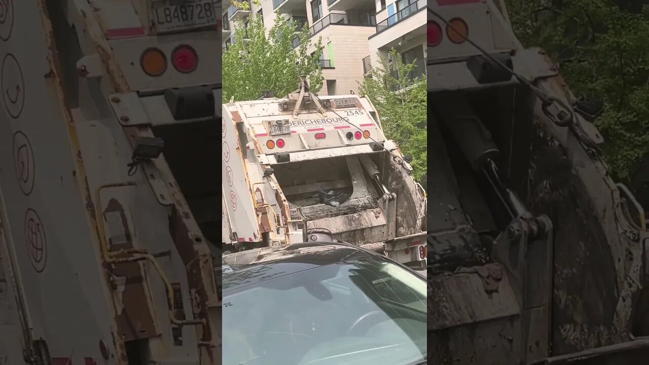 Large sofa grinding up by Truck garbage collector