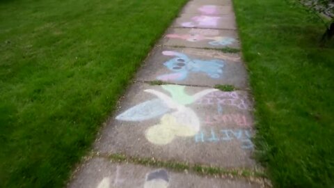 Lansing mother-daughter duo spent two days creating chalk artwork to spread joy