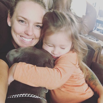 Snuggling pit bull is a cuteness overload