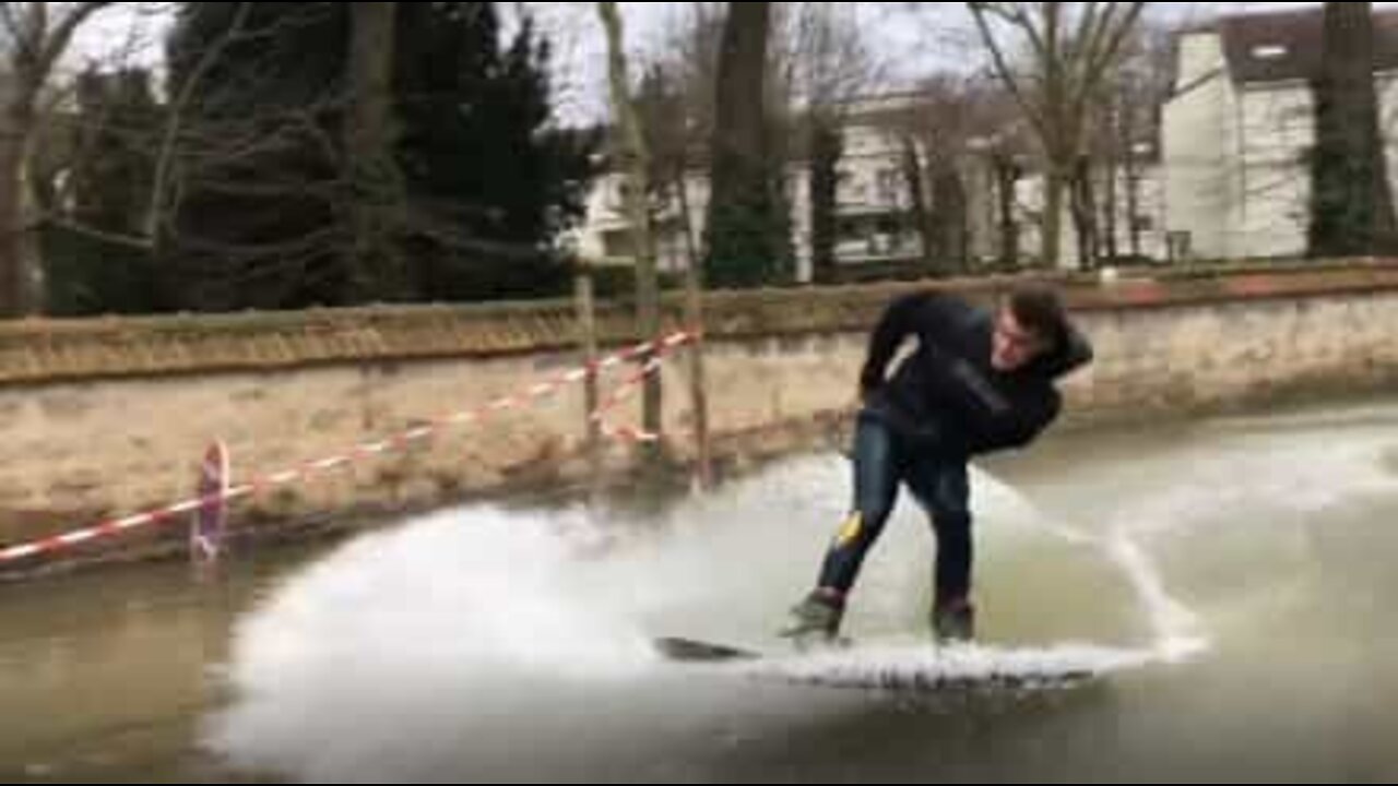 Parisians practice wakeboarding in flooded city