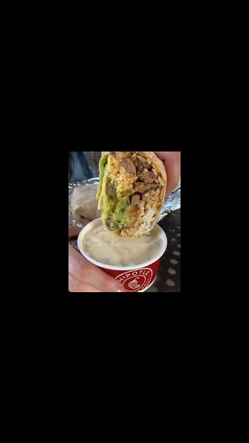 Best ever queso dunked burrito | @westfieldsouthcenter on IG 🌯🧀 #shorts #chipotle