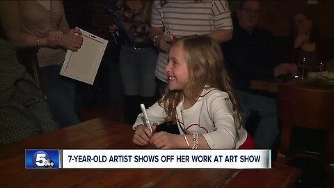 Dozens of people showed up for Kylie Earl's art show in Tremont to make her special wish come true