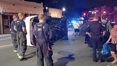 Boston police and fire respond to 15 Washington Street for a car rollover