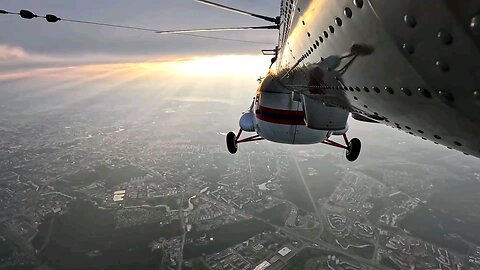 Paratroopers-rescuers of the show "GAASU" AVIATION " jump from a Mil Mi-17V-5 (EW-601EP) of the...