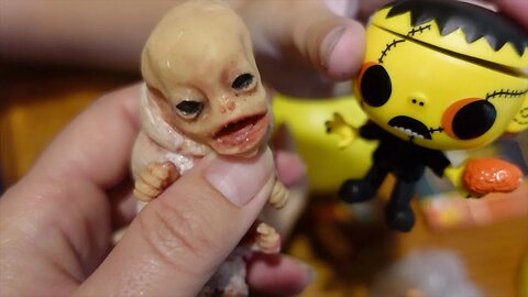 Our alien caterpillar creature Sasuke gets surprise Boo Hollow figures!