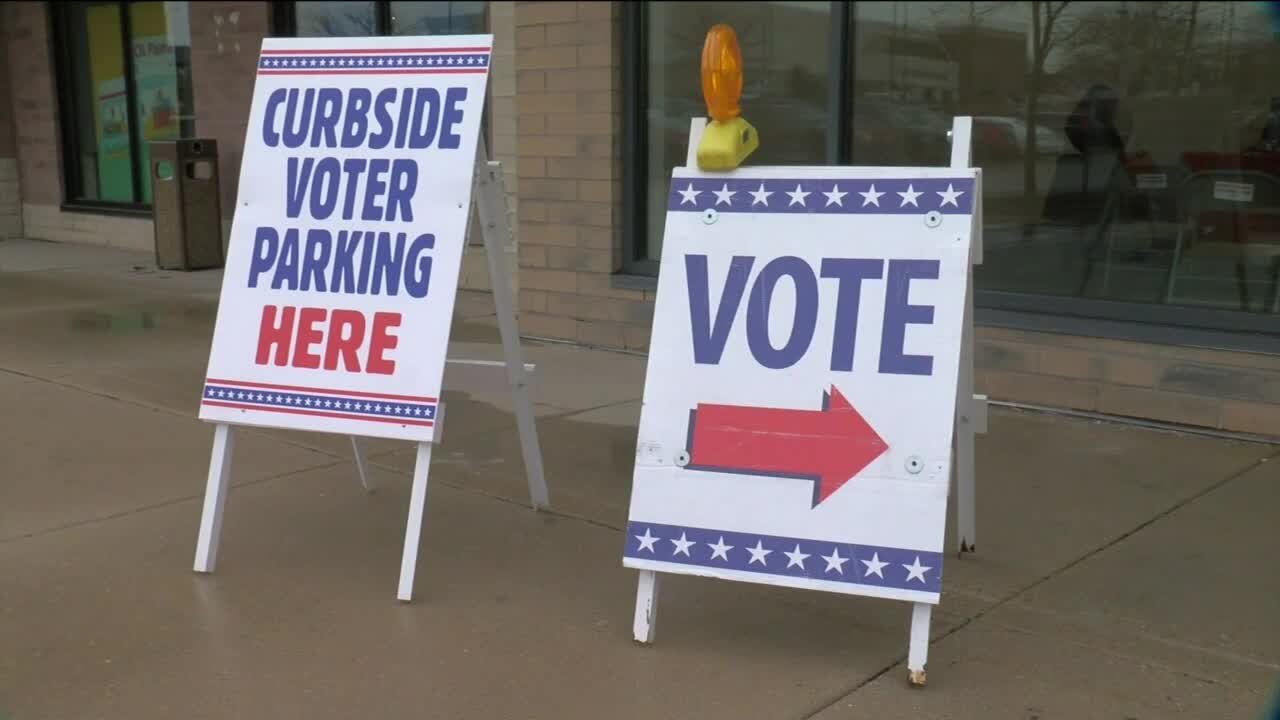 Milwaukee LGBTQ+ voters march to the polls on final day of early voting