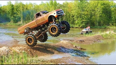 MUD Mega Trucks Jumping at Mud Bog - 4X4 Mud Off-Roading