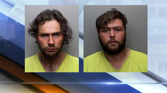 2 men arrested after body found in building