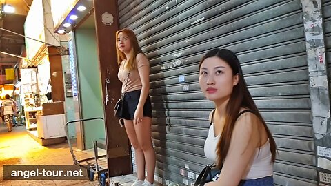 Hong Kong Temple street prostitutes waiting for customers.