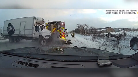 Out-Of-Control Semi-Truck Jackknifes First Responder Vehicles On Icy Highway In Michigan