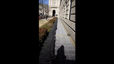 IRS BUILDING IN DC. SHUTTERED. SANDBAGS ALL AROUND IT. WHY?!