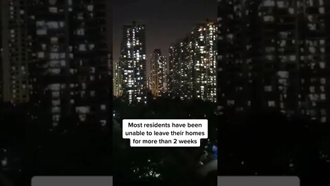 People in Shanghai scream from windows amid lockdown