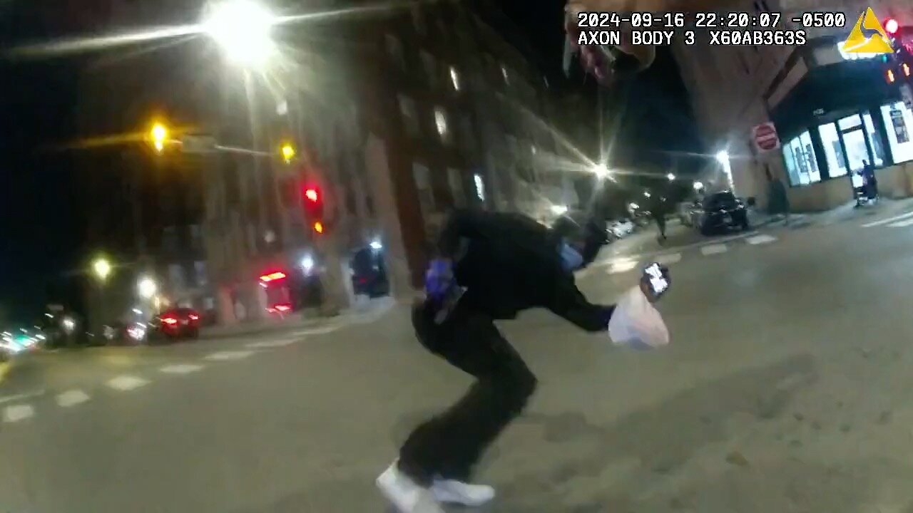 Body Camera Footage Shows Chicago Police Shooting at Fleeing Armed Suspect