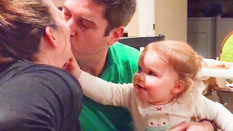 Babies Reaction When Daddy Kiss Mommy