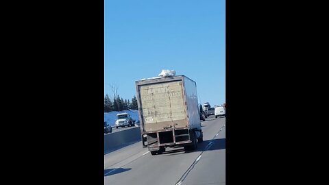 Snow Flys Off Truck