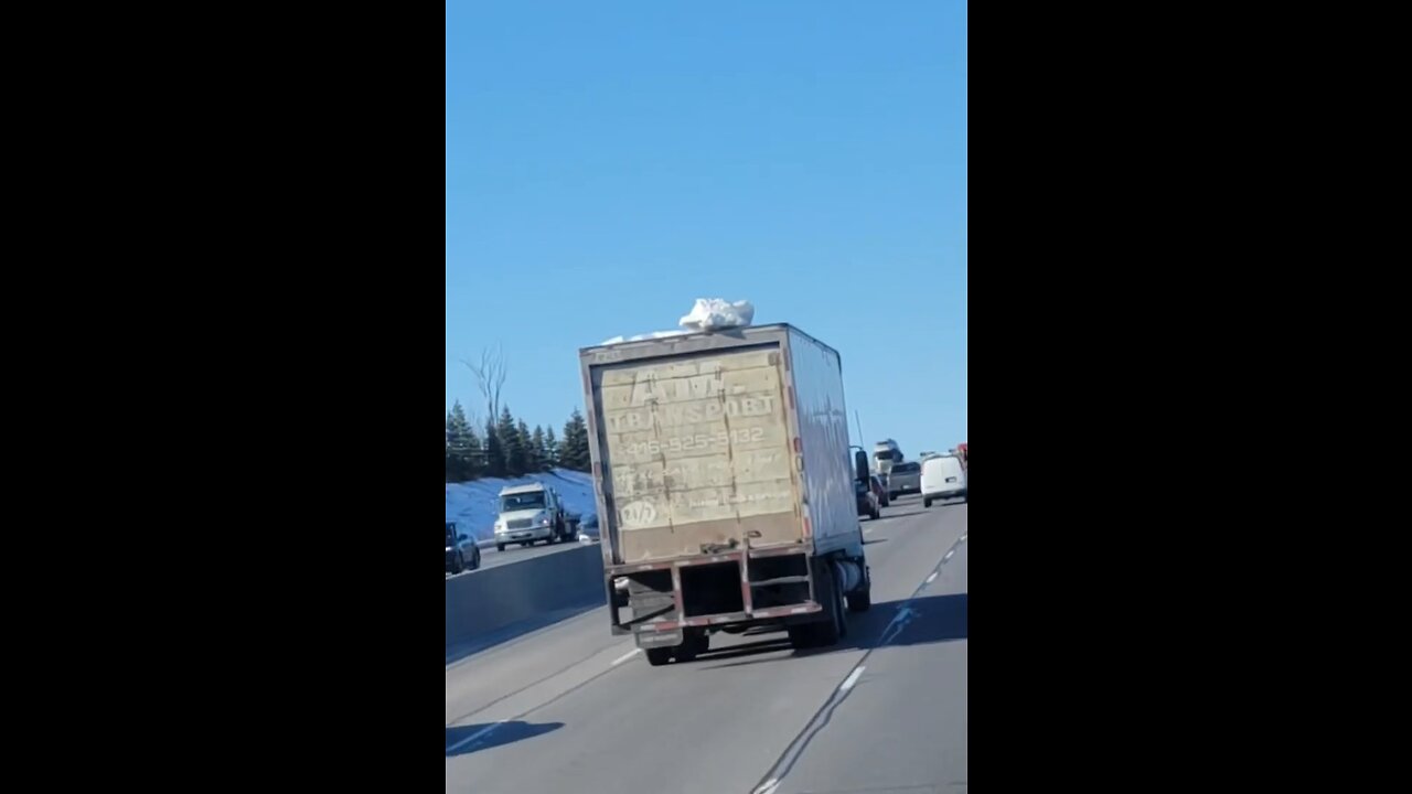 Snow Flys Off Truck