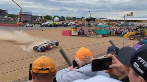 Car flips over at the start of the British GP