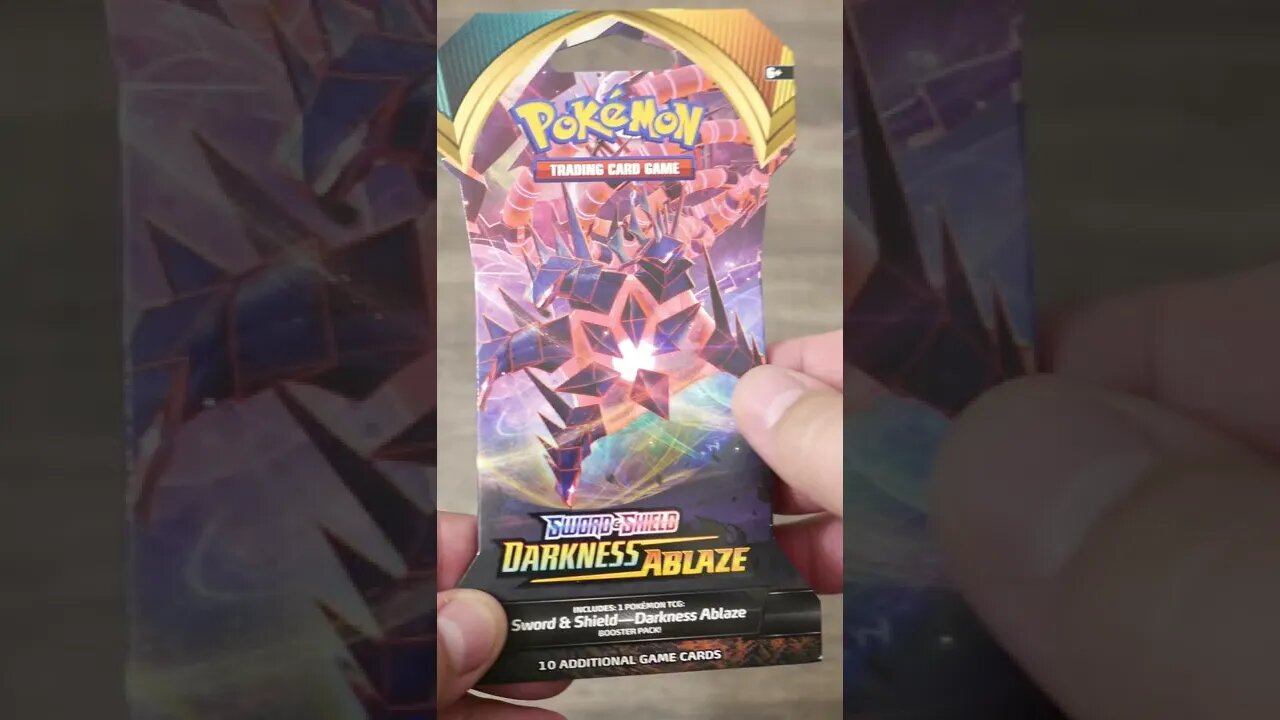 #SHORTS Unboxing a Random Pack of Pokemon Cards 057