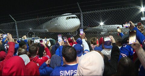 Buffalo Bills fans greet team at airport after comeback win over Kansas City Chiefs