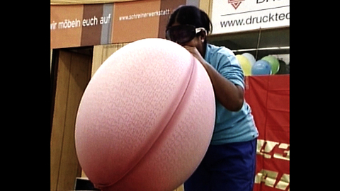Woman Blows Up Hot Water Bottle