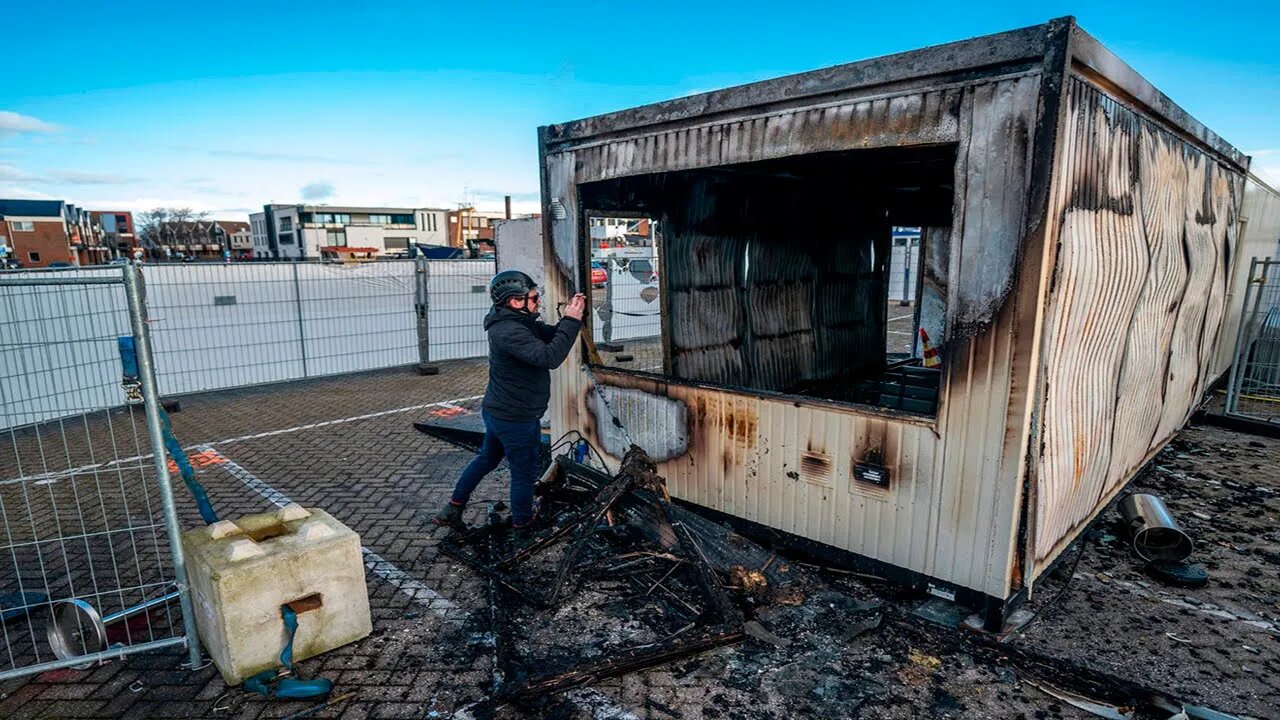 Dutch Protesters Torch Covid Test Center on First Day of Curfew