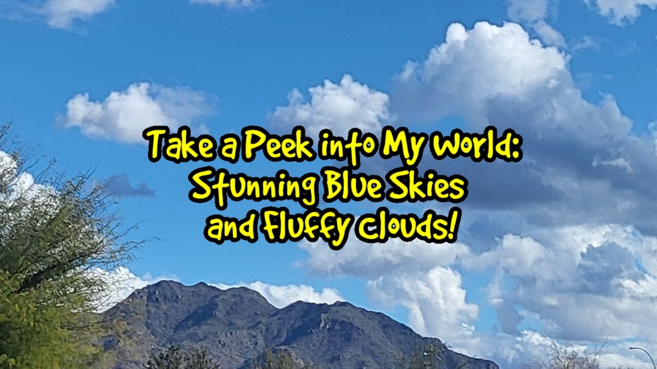 Take a Peek into My World: Stunning Blue Skies and Fluffy Clouds!