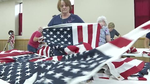 Preparing for the "Field of Flags" to honor victims of 9/11