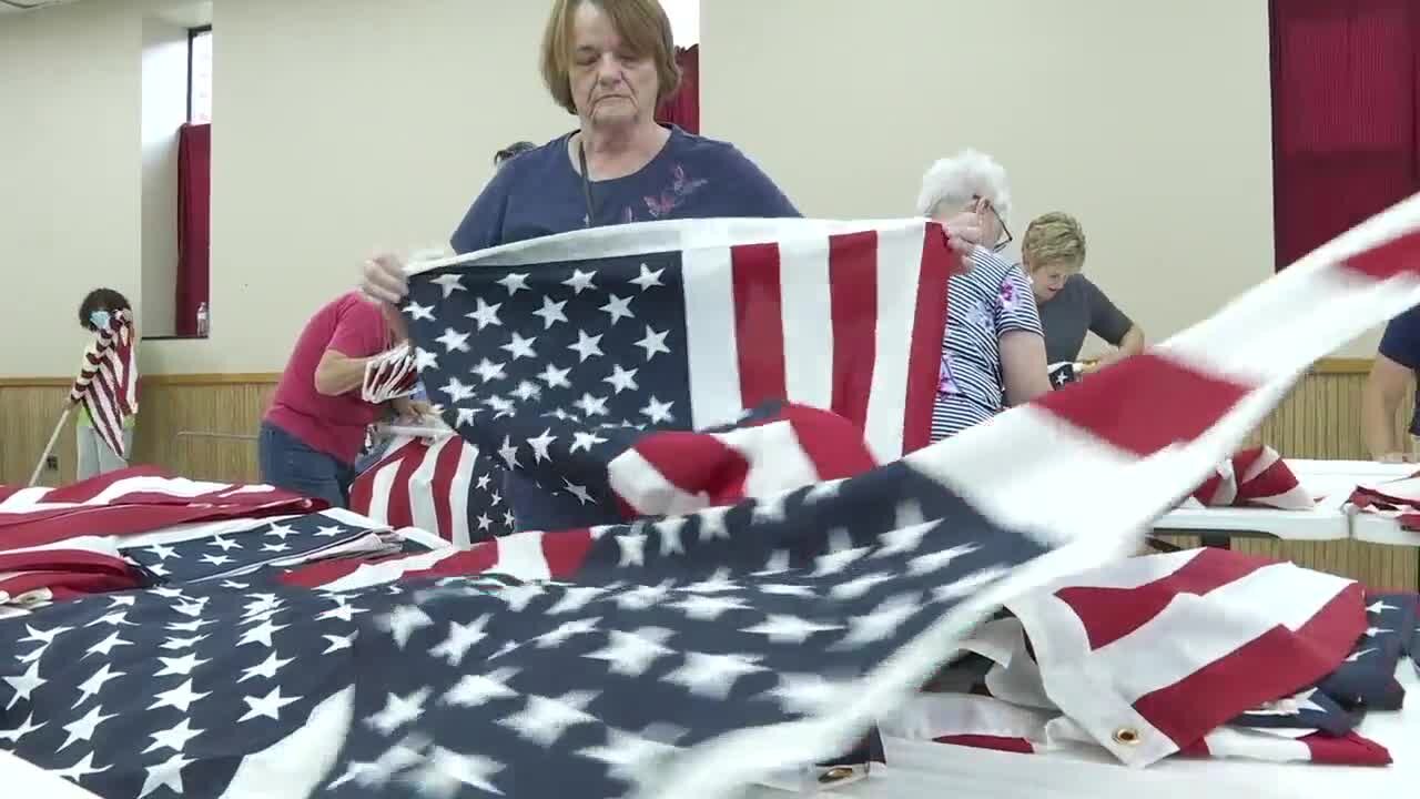 Preparing for the "Field of Flags" to honor victims of 9/11