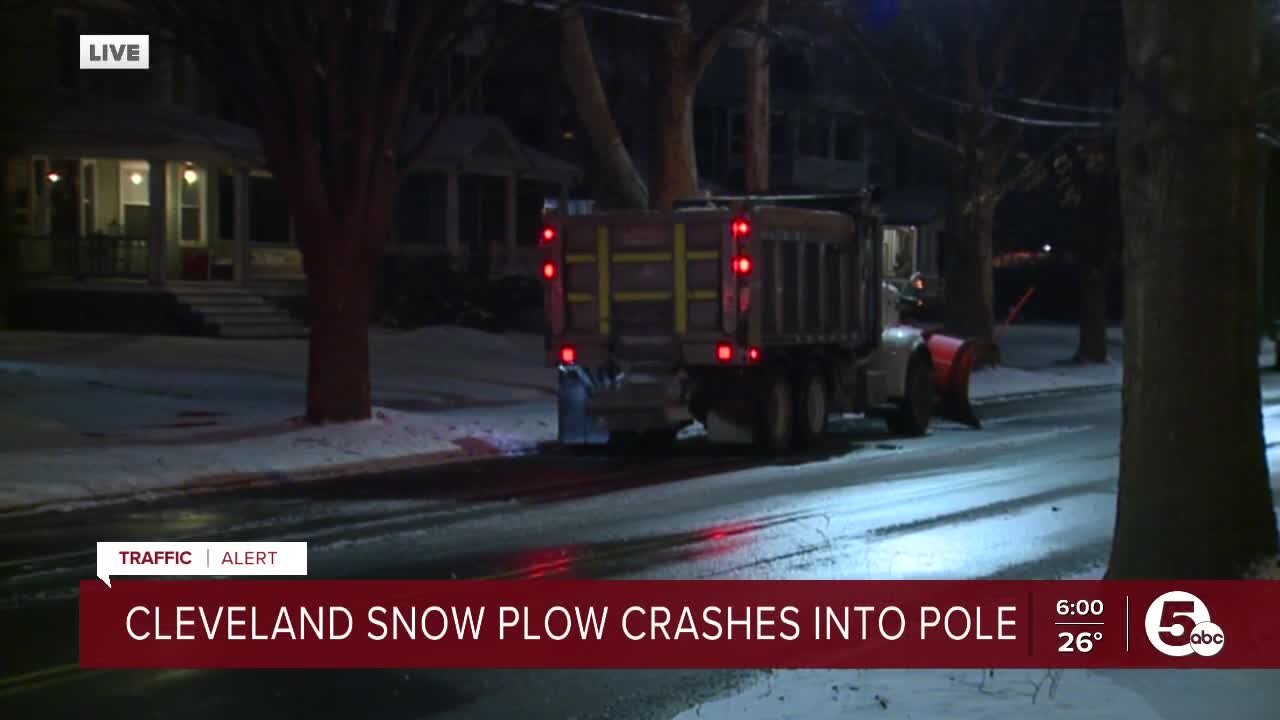 Cleveland snow plow takes out pole