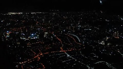 Aerial View of Manila at night PAL Flight Takeoff