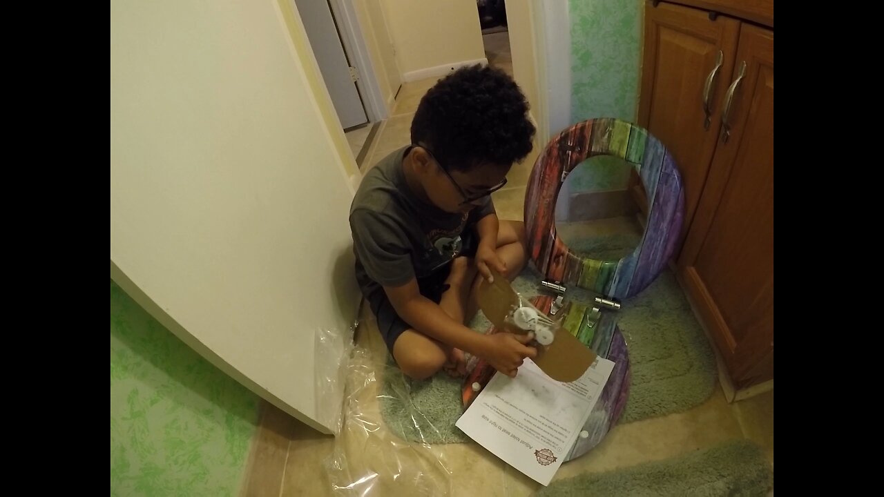 Blasian Babies Brother Helps DaDa Remove And Replace A Toilet Seat At GrandMaMa's guest bathroom!