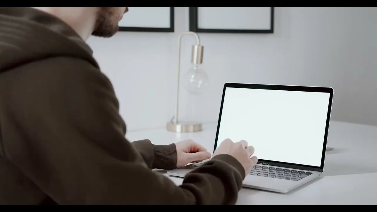 Person using Apple Macbook Pro iOS Royalty Free Stock Footage No Copyright Video