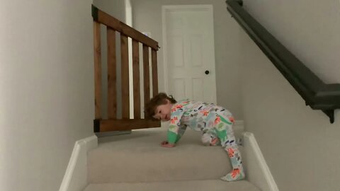 Grant Sliding Down Stairs