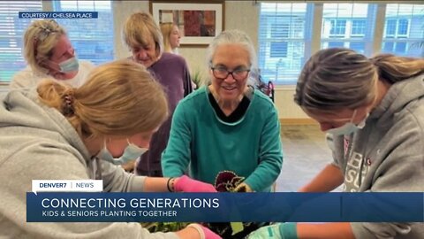 Kids & Seniors join together to pot plants