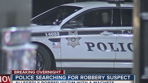 Robbery suspect on the run after helding up a man with a machete