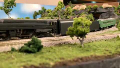 N Scale heavy iron ripping across the layout.