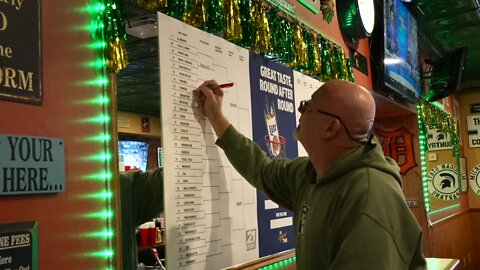 Customers at the Courthouse Pub in Mason share how to skip work for the NCAA Tournament