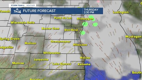 Warmer Thursday with scattered showers