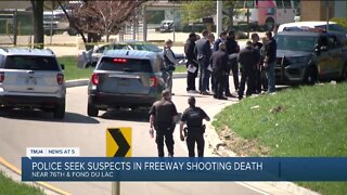 Police seek suspects in freeway shooting death