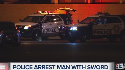 Standoff ends with sword-wielding suspect in custody