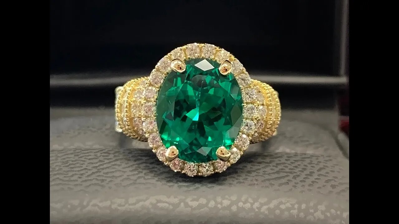 Amazing custom 18k gold ring with 12x10mm Chatham oval emerald center