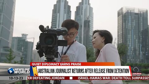 Australian journalist returns after release from detention