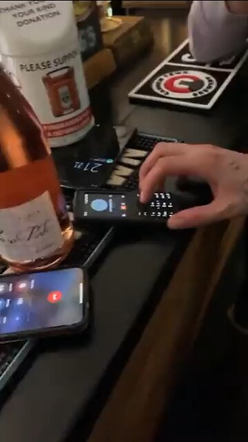How to pop a cork out of a bottle using cell phones
