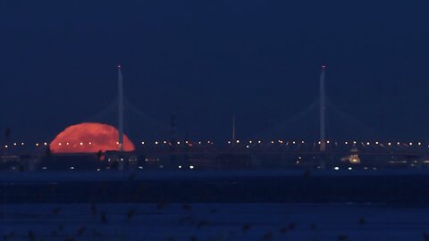 A beautiful full moon over St. Petersburg Russia