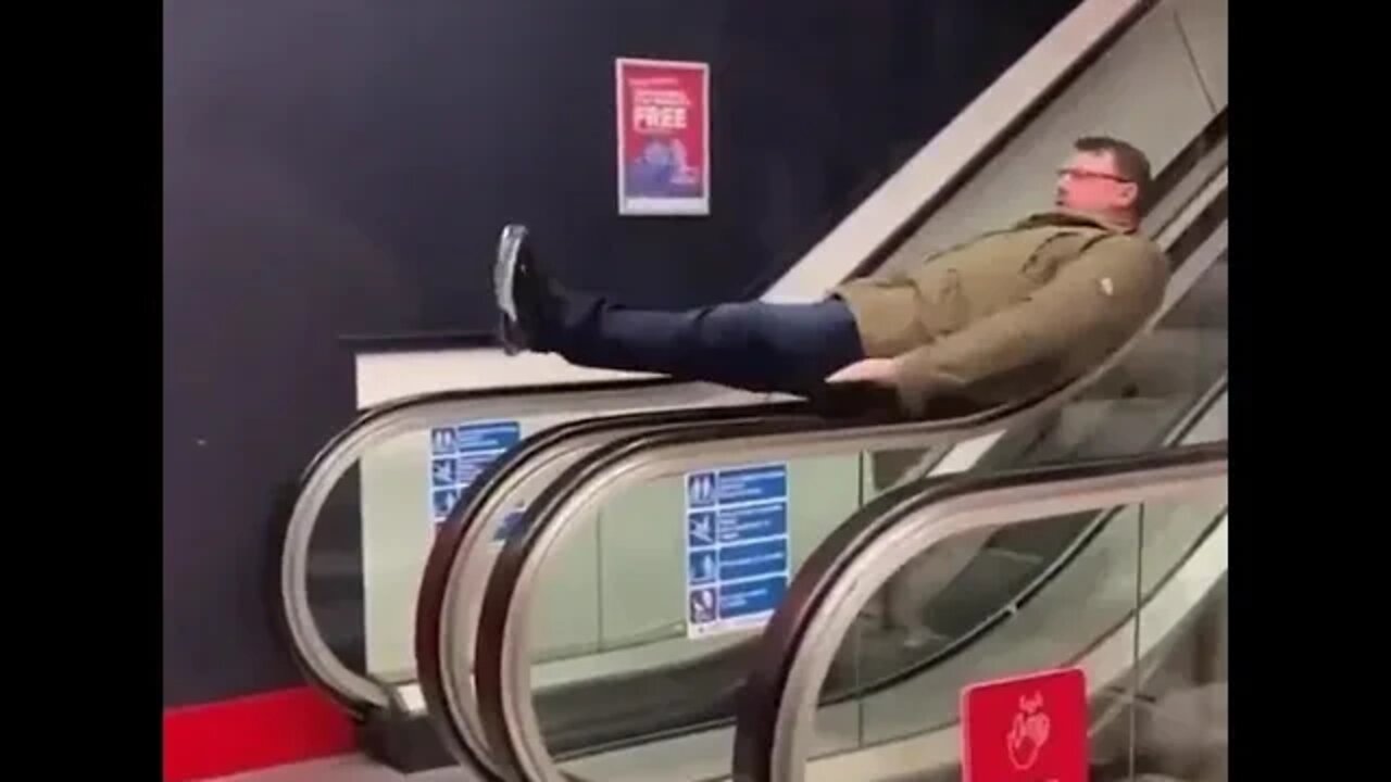 Fella Spins On The End Of An Escalator