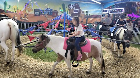 4-year-Old Horse Rider at the Fair