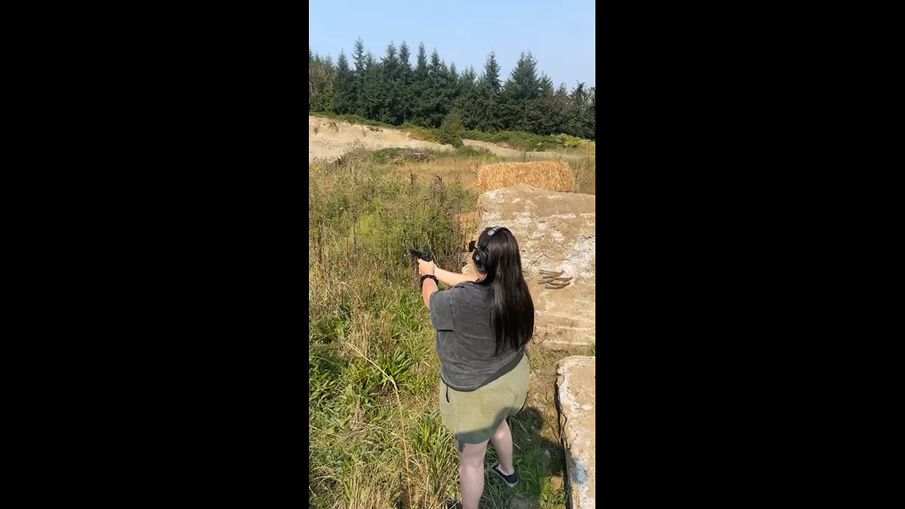 My woman shooting the 1911