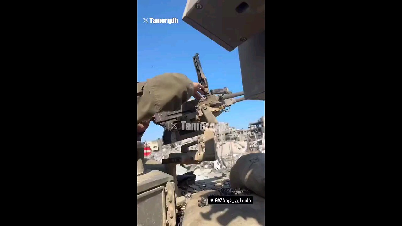 With a huge smile & immense satisfaction, Israeli soldier fires a machine gun indiscriminately ⏬desp