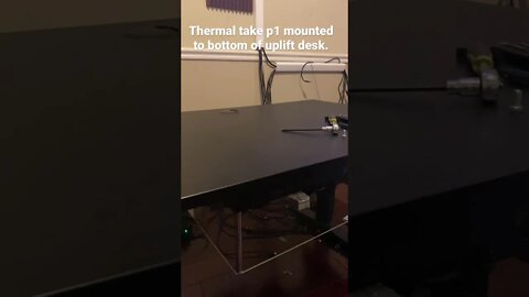 Mounted pc to uplift desk.